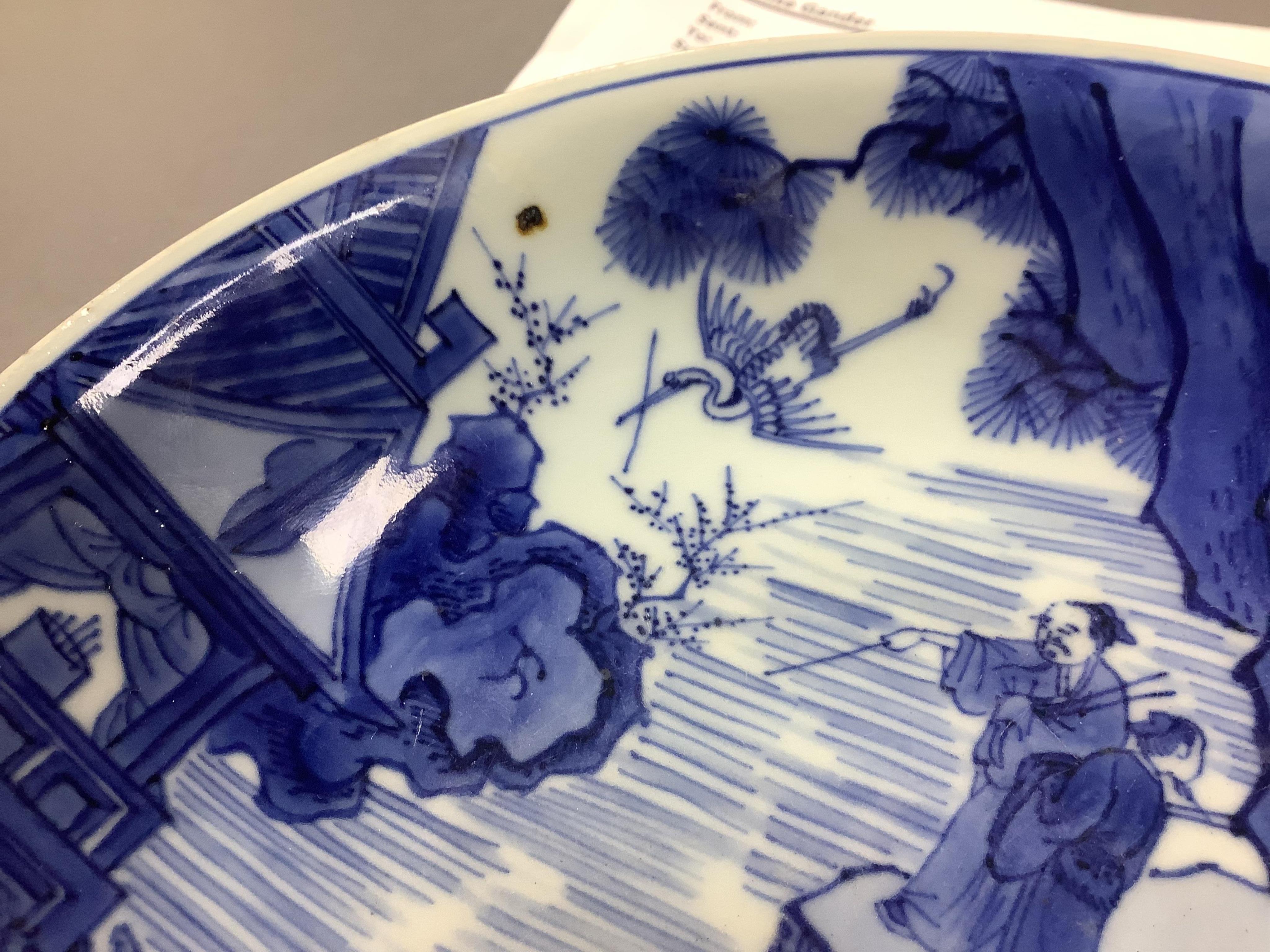 A Chinese blue and white saucer dish, Kangxi six character mark and of the period (1662-1722)